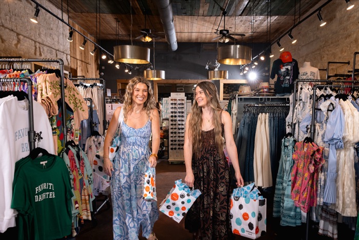 Two shoppers inside a Fredericksburg boutique