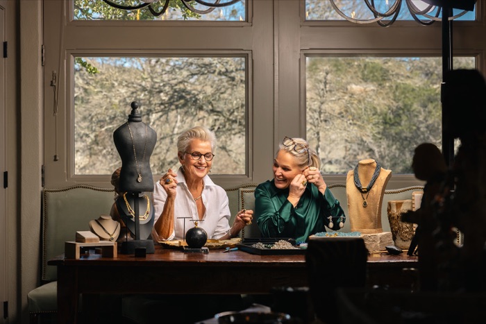 Jewelry makers working at their studio bench