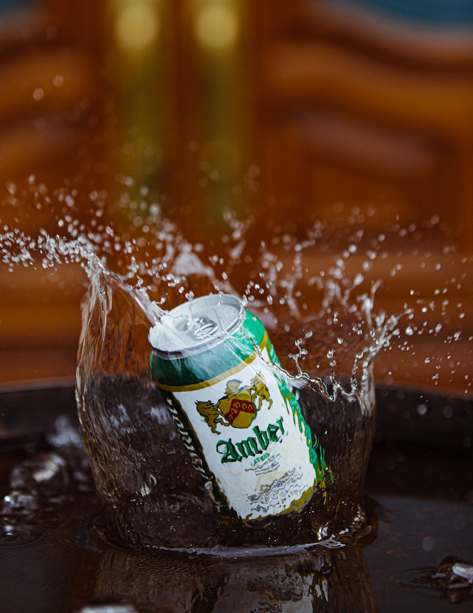 Altstadt beer can with splash, photographed for a brewery product campaign